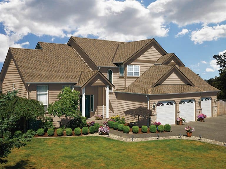 brown house with new roof