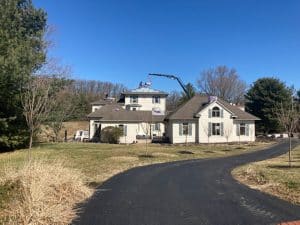 custom roof in maryland with a roof crane